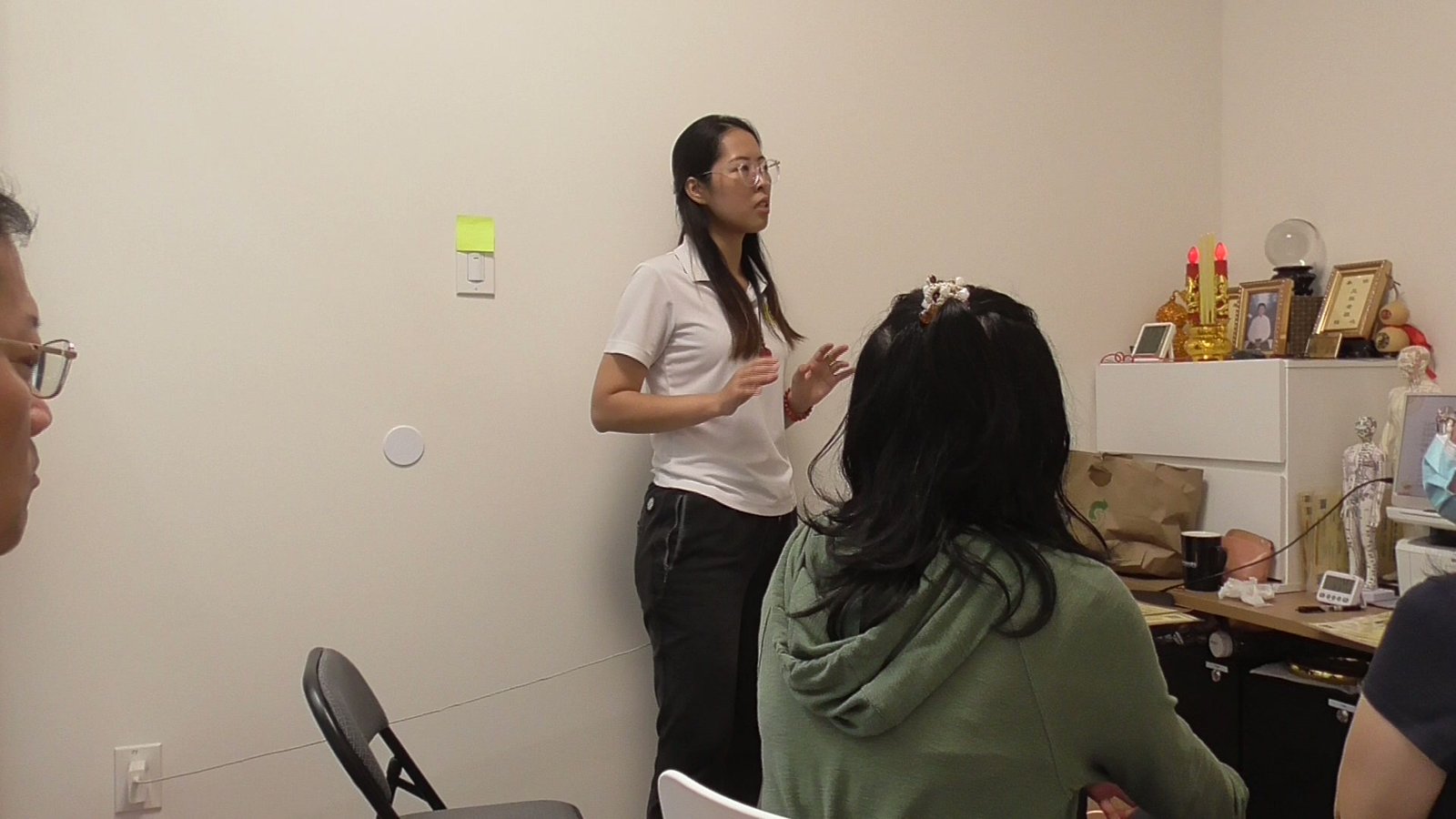 An early foundations session at the Los Angeles studio, participants seen from behind